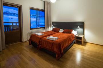 Фото номера Апартаменты с 3 спальнями и сауной - Дополнительное здание A Отель Lapland Hotels Saaga г. Юллясярви 3