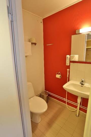 Фото номера Двухместный номер с 2 отдельными кроватями Отель Ylläs Lake Hotel г. Юллясярви 8